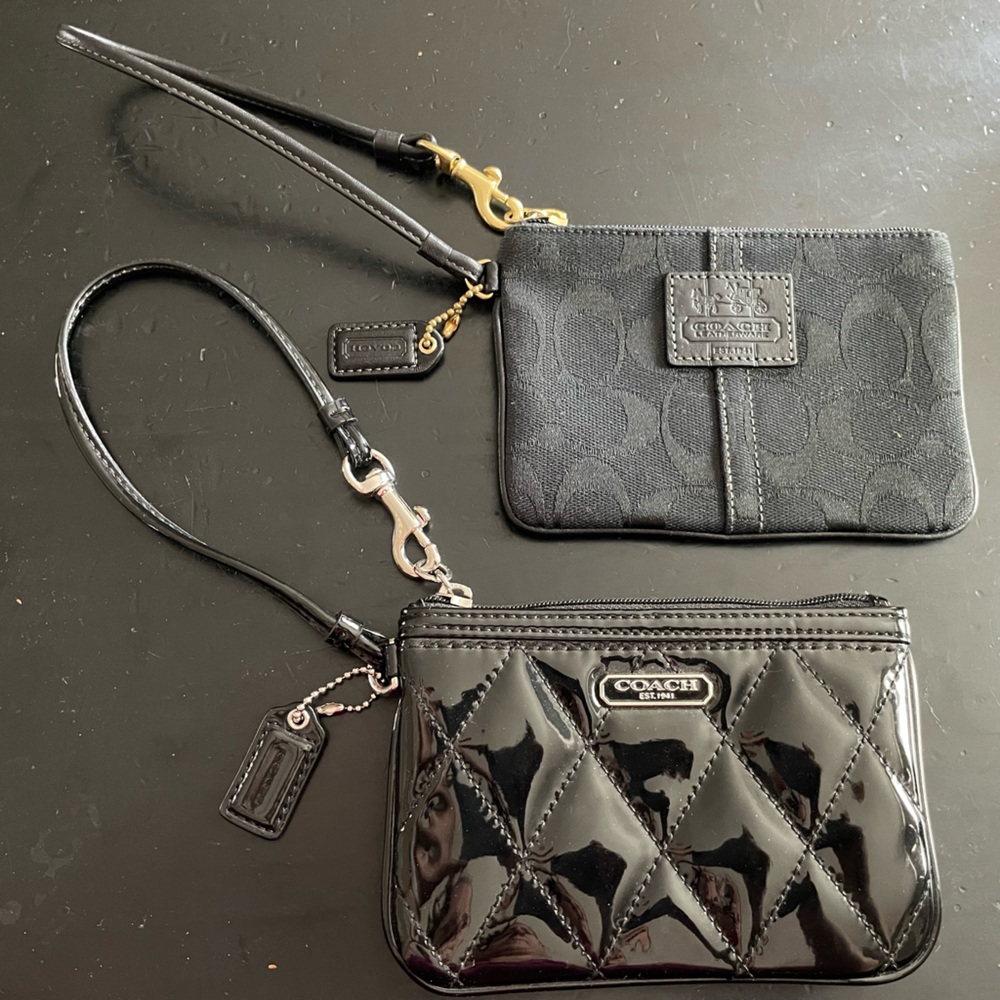 Clean, Chic Black Coach Wristlets with dust bag & box!